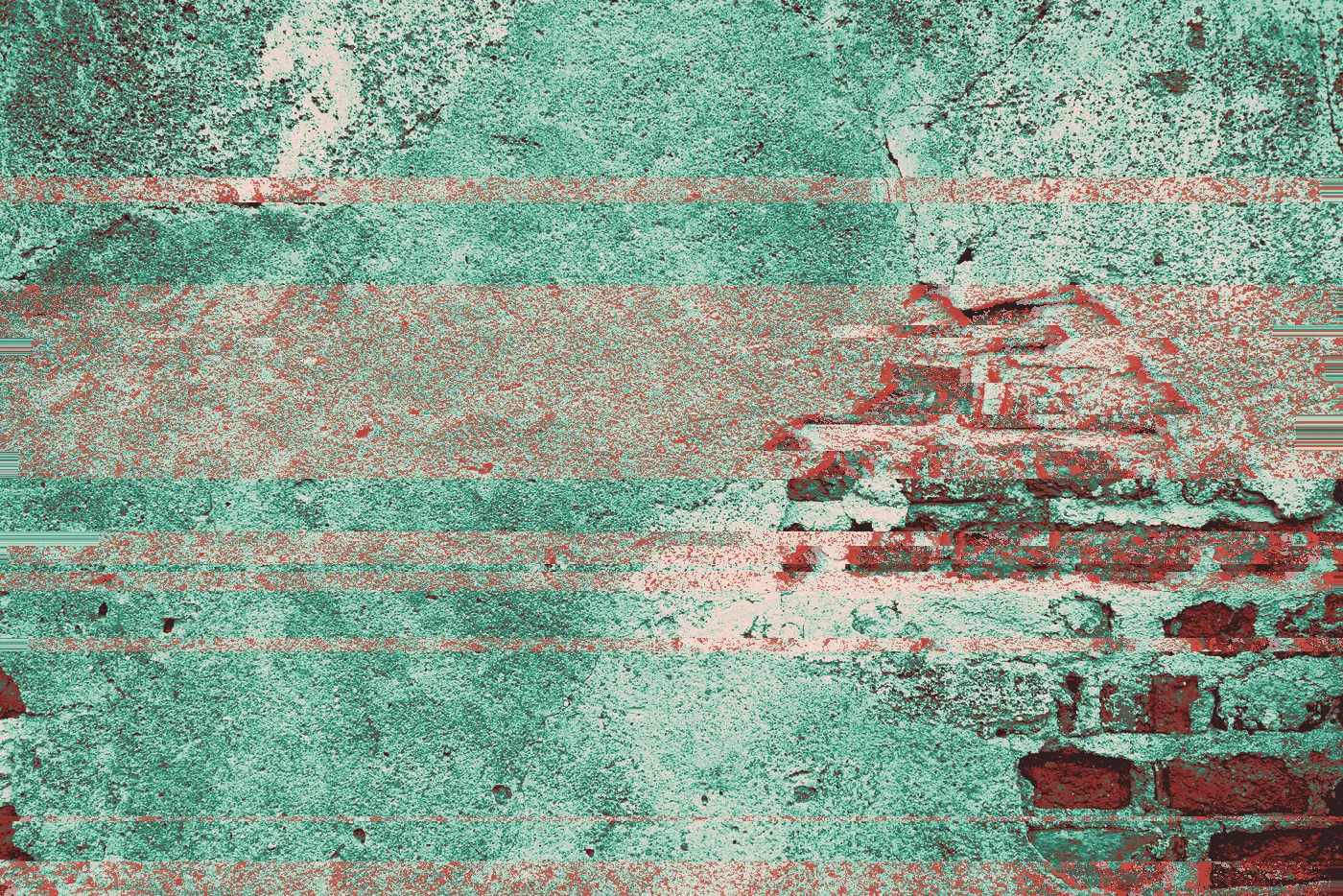 Crumbling grey plaster peeling away to expose old red bricks underneath