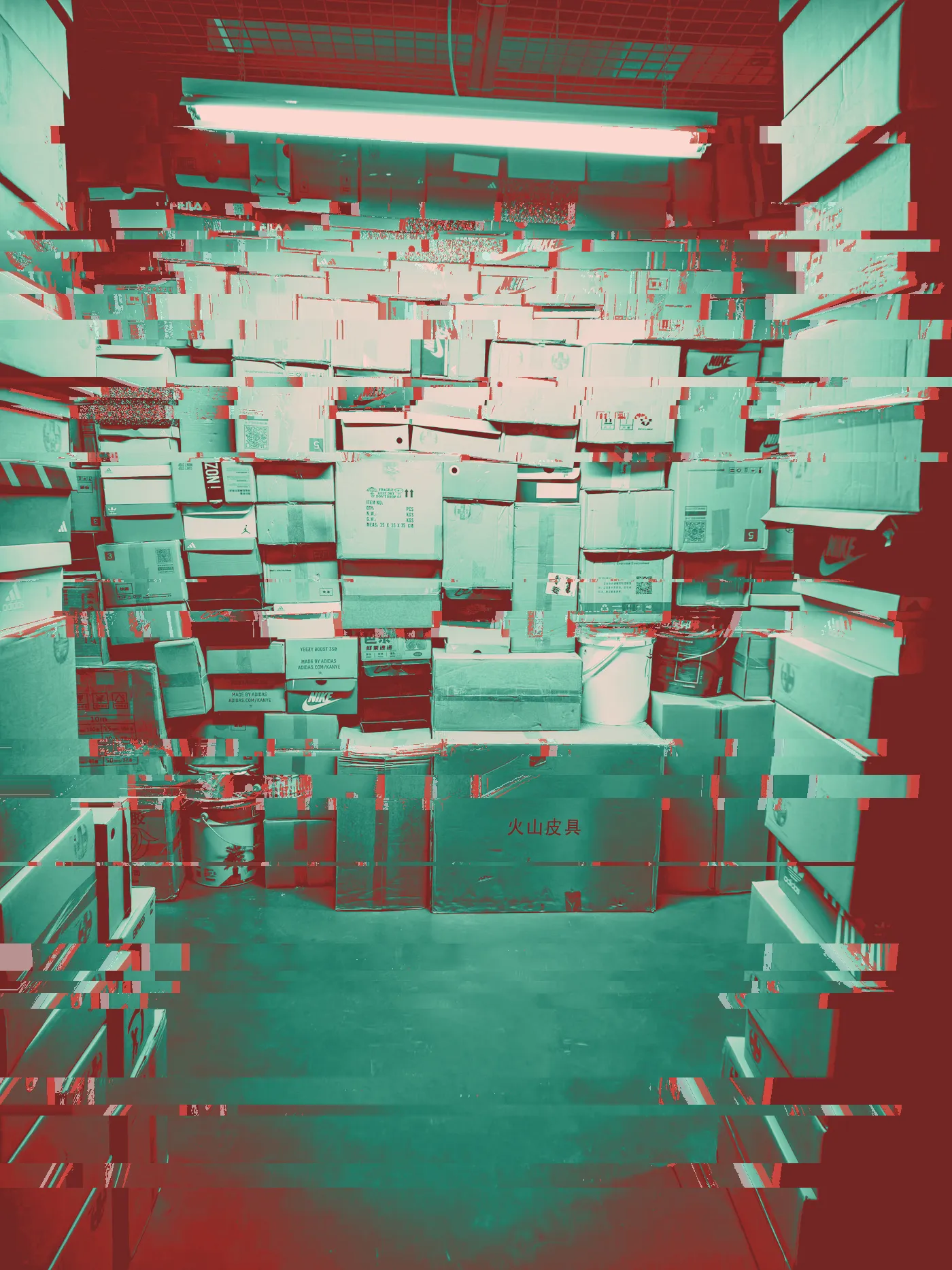 Storeroom piled floor to ceiling with cardboard and Nike shoe boxes