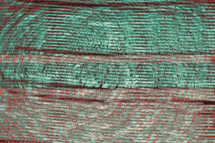 Blurred, warped lines of colourful source code on a screen in purple and blue