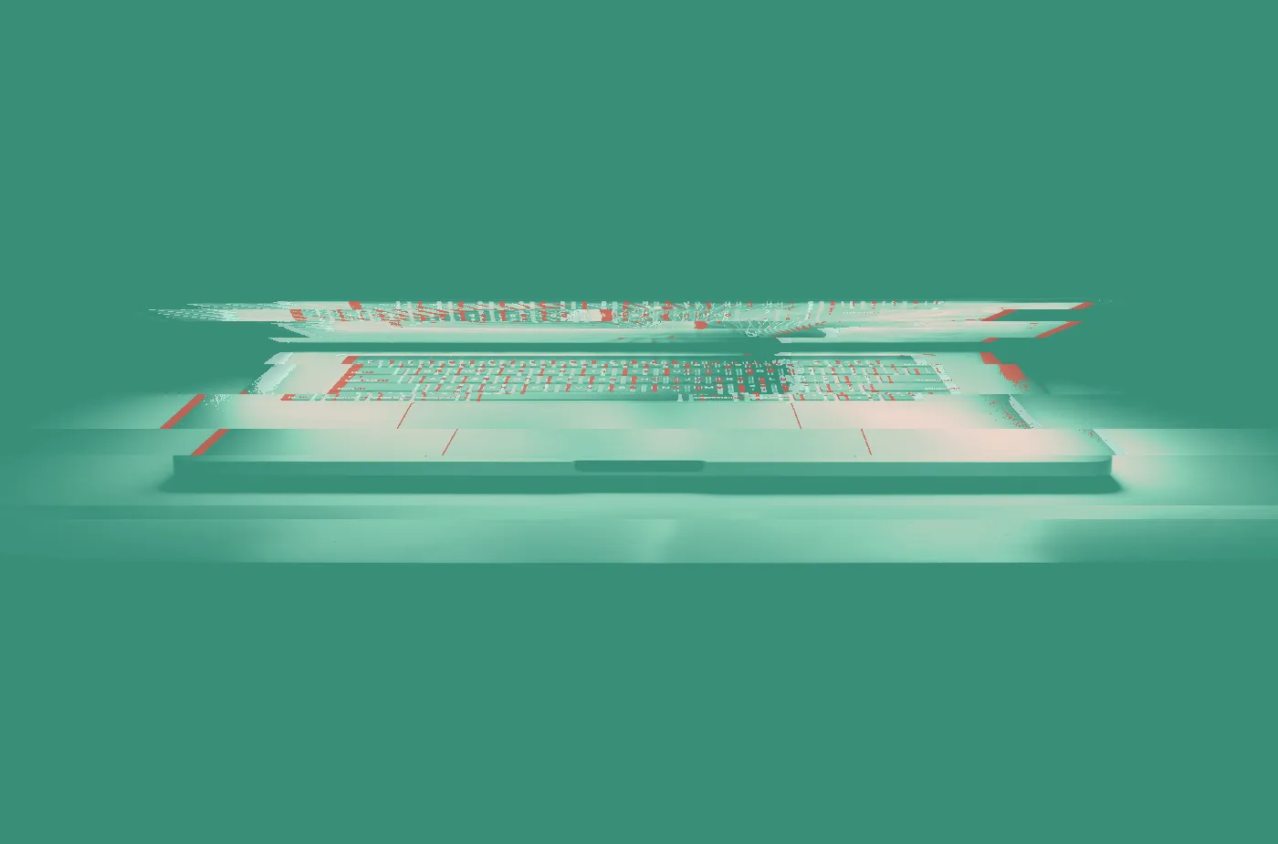 Barely open laptop glowing orange and purple against a black background